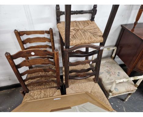 Five rush seated ladder back chairs