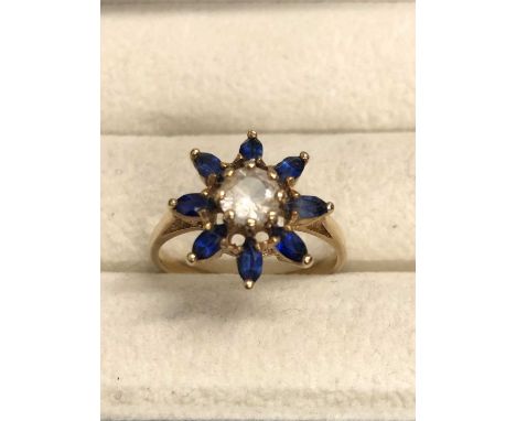 A gemset dress ring unhallmarked stamped 10ct assessed as 10ct gold, ring size O, weight 2.8 grams