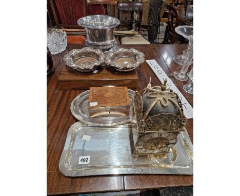 A silver-plated fish cutlery set, a wine bucket a pair of coasters, a lantern-type shelf clock, four tankards etc. 