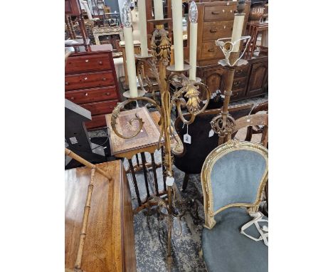 Two tripod standard lamps, one in gilt metal with five lights, the other with a single light