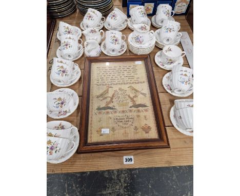 Royal Worcester tea wares together with a sampler print.