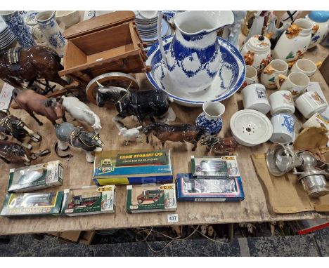 Die-cast lorries, china horse ornaments, a hunt pattern tea set, a vintage cycle lamp, etc. 