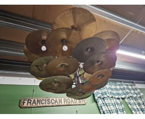 An unusual cymbal kit hanging light fitting. 