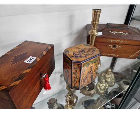 A 20th century painted satin wood single compartment tea caddy, two two compartment tea caddies and a brass candlestick