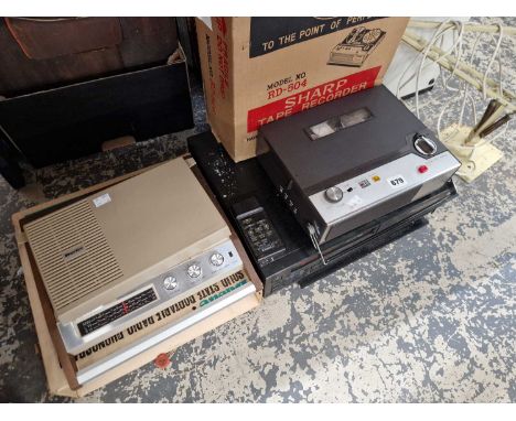 A Sharp model RD-504 tape recorder, A Fisher video cassette recorder, a solid-state portable radio-phonograph, a angle poised