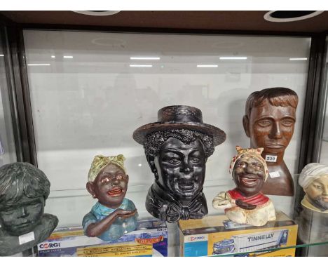 Two iron female form money boxes, two porcelain tobacco jars and three other head and shoulder pieces Notice from the the-sal