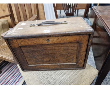 A oak cased tool cabinet
