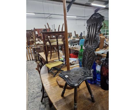 A spinners chair, a standard lamp, a stool and a corner table