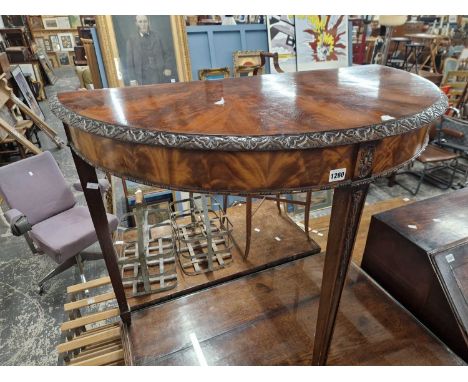 A mahogany demi-loom hall table.