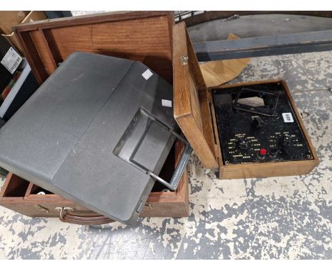 A vintage typewriter, an ameter  and a teak box.