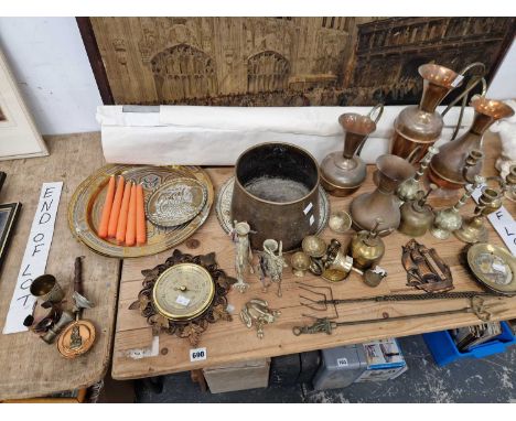 Brass and copper to include candlesticks, a frog, jugs, chargers, fire tools and two movie posters etc.