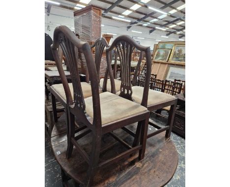 A set of four Chippendale taste mahogany chairs together with three other chairs and an Indian embroidered cushion
