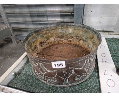 An Arts and Crafts copper cylindrical planter 
