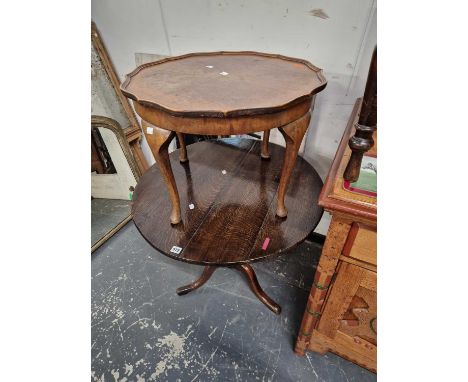 A Georgian oak tripod table and a later walnut coffee table.