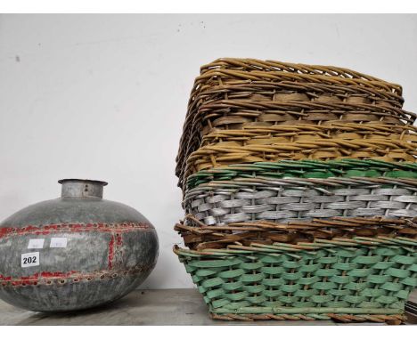 An aluminium churn, various baskets and a metal bun shaped jar