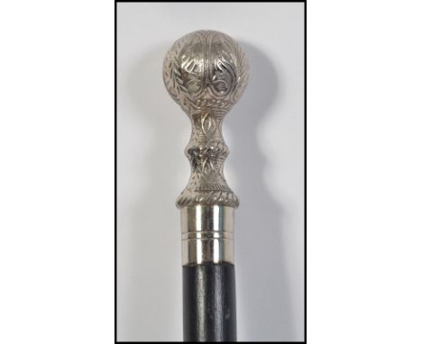 A silver plated gentlemans walking stick / promenade cane. The ebonised tapering shaft wit silver knop end H97cm