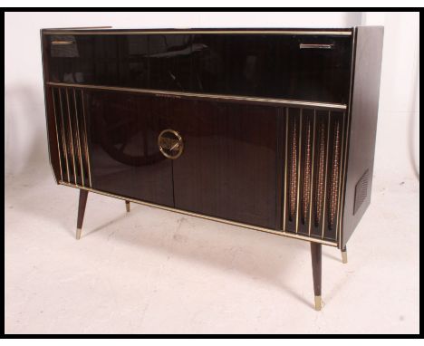 A retro 1950's / 1960's Blaupunkt Barcelona radiogram. Having a four speed Garrard record deck and radio. The Blue Spot radio