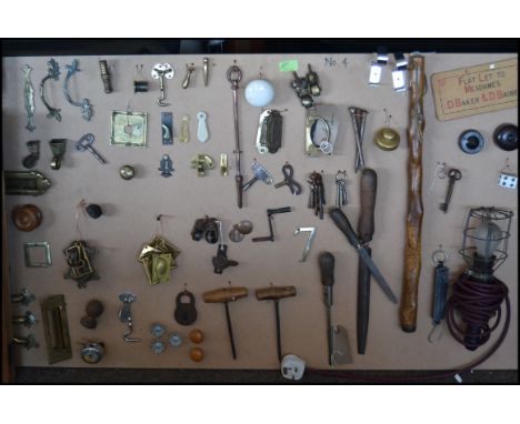 A fabulous collection of mounted handles, hinges, tools, doorknobs, brackets etc dating from the Victorian and 20th century. 