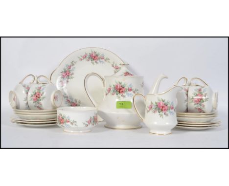 A 6 setting Royal Standard ' Rambling Rose ' pattern tea service. Makers marks to base. Comprising teapot, cups, saucers, pla