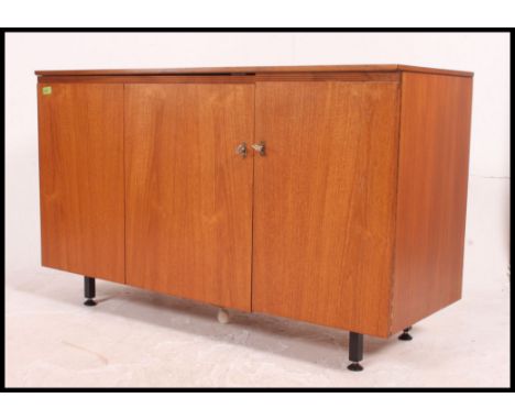 A fabulous mid century danish style compact modular desk with internal drawers filing system etc that folds away to attractiv
