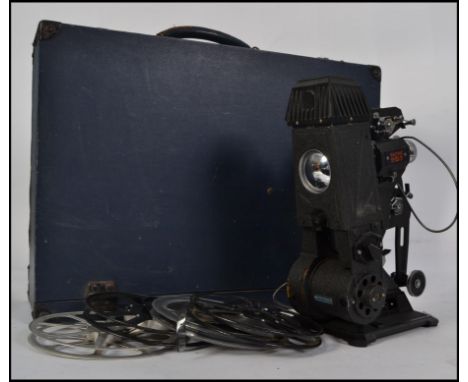 A vintage original Pathe 95 projector complete in the carry case with films to include scenes of Longleat 69, Weddings, Horse