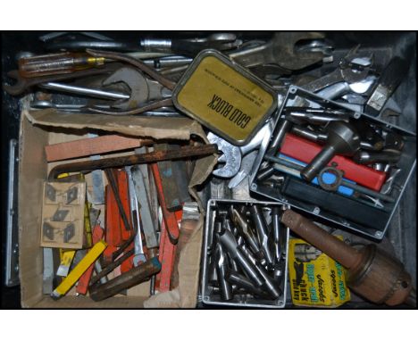 A collection of industrial engineering tools, to include lathe bits, spanners  etc please see images