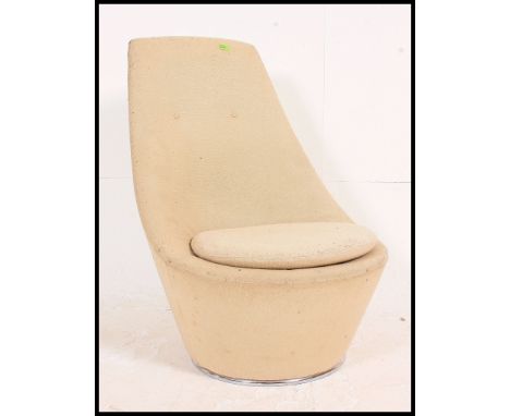 A vintage 1970's Heals swivel tub / egg shaped chair complete with the original fabric upholstery H90xW60xD60cm