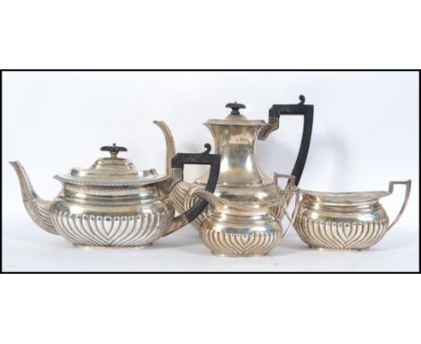 A silver hallmarked tea / coffee service to include teapot, coffee pot, sugar bowl and creamer. London hallmarks for Horace W