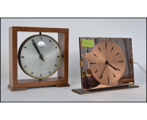 A retro 1940's Smiths Sectric Peach mirror glass mantel clock together with a retro Smiths Sectronic mantel clock. Measures H