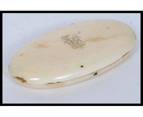 A 19th century ivory cased sewing set, the ivory case of lozenge form being, monogrammed to the lid. The interior with gilded