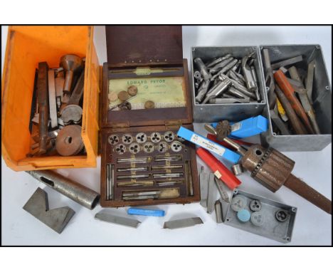 A collection of industrial engineering tools, to include tap and die sets, lathe bits etc please see images