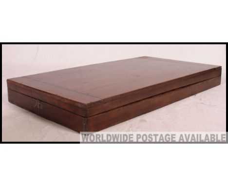 A Victorian large mahogany folding bagatelle games board. The solid mahogany case with baize lined interior. Measures H147 x 