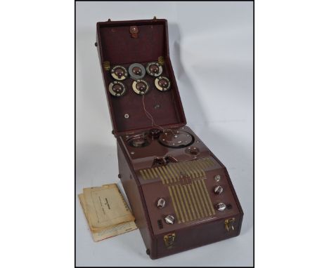 A vintage mid century Webster - Chicago tape recorder - Electronic memory. Complete in the case with dials and decorative fac