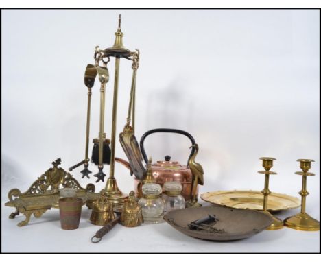 A good quality brass fireside compendium set, brass kettle, scales, Middle Eastern coffee pot etc