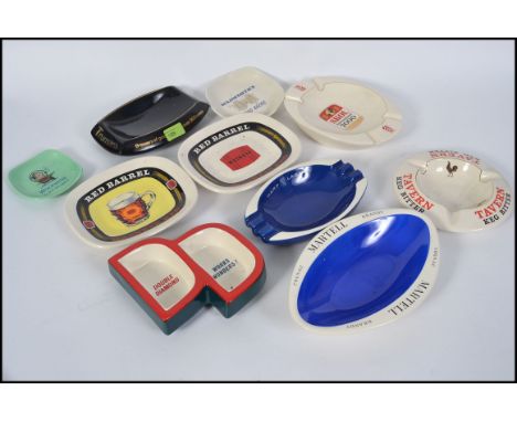 A good collection of vintage and retro advertising pub ashtrays, to include Martell, Harp, a space age Woodbines and others.