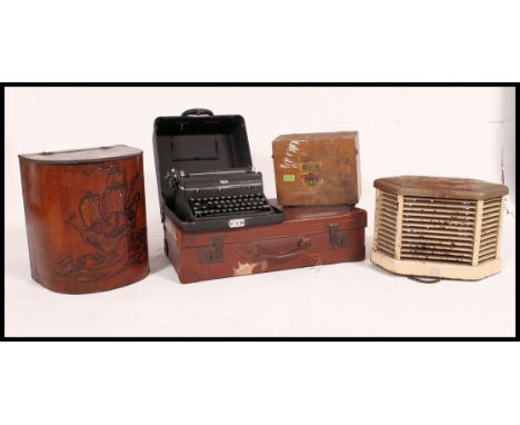 A vintage 1940's American portable typewriter complete in the original carry case by Royal. Together with a vintage leather s