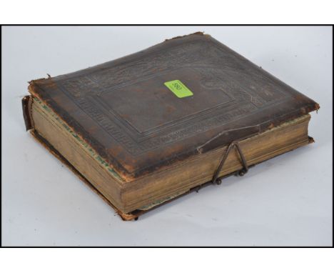 A 19th century / early 20th century leather photograph album containing many photographs - portrait studies ( see multiple il