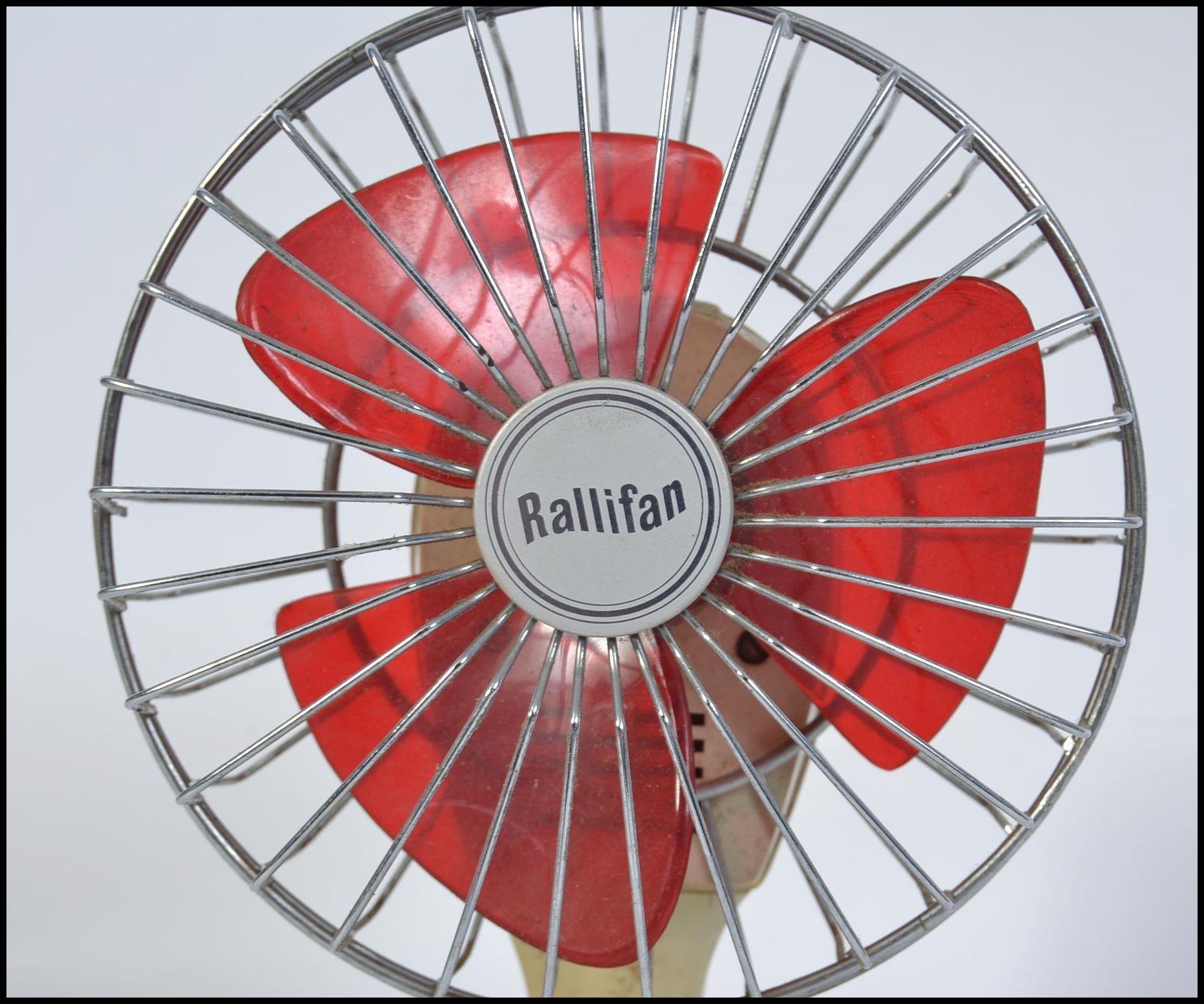 A vintage retro Rallifan miniature desktop electric fan. With original red blades. Measures H25 x