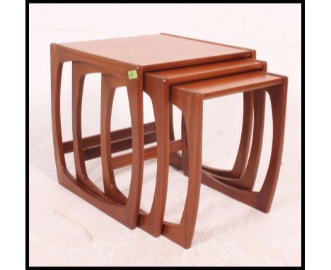 A vintage 20th century Danish influence G-Plan Kelso teak wood nest of tables, each table of graduating form. H49xW49xD56cm