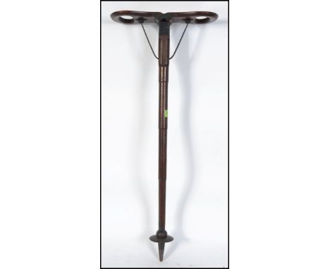 A stunning early 20th century oak shooting stick by W S Moore and Grey L76cm. Of tapering form with fold down seat / handle.