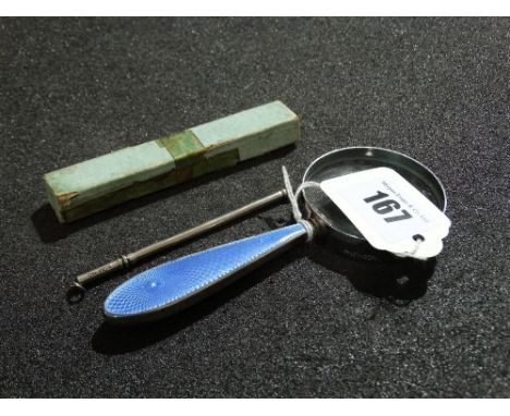 A Silver And Blue Enamel Handled Magnifying Glass Together With A Silver Swizzle Stick