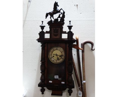 A Pendulum Wall Clock With Circular Dial