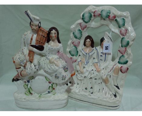 A Staffordshire Pottery Clock Group Together With A Staffordshire Pottery Group Of A Seated Couple