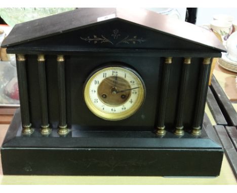 A Victorian Black Marble Encased Mantel Clock With Circular Enamel Dial