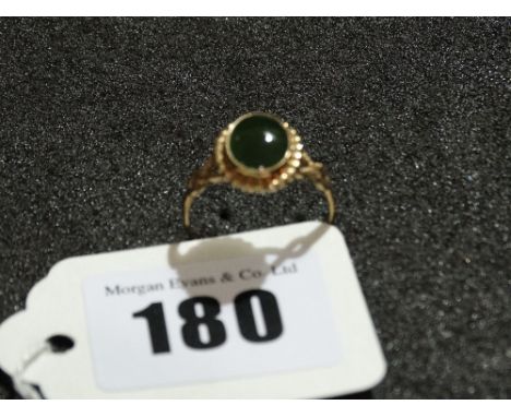 A 9 Carat Gold Jade Set Ring
