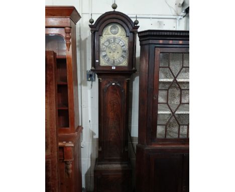 An 18th Century Mahogany Encased Long Case Clock, The Hood Enclosing An Arched Brass And Silvered Dial With Eight Day Movemen