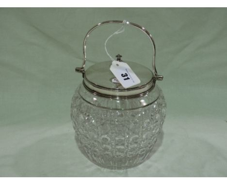 A Cut Glass Biscuit Jar With Plated Mounts