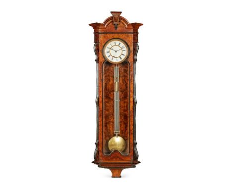 LARGE WALNUT AND EBONISED VIENNA WALL REGULATOR 19TH CENTURY the arched cornice above a white enamel dial with Roman numerals