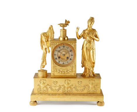 FRENCH EMPIRE FIGURAL GILT METAL MANTEL CLOCK EARLY 19TH CENTURY  the silvered engine turned dial in a plinth surmounted by a