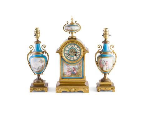 FRENCH PORCELAIN AND GILT METAL CLOCK GARNITURE 19TH CENTURY the arched case with a porcelain urn finial above a porcelain Ro